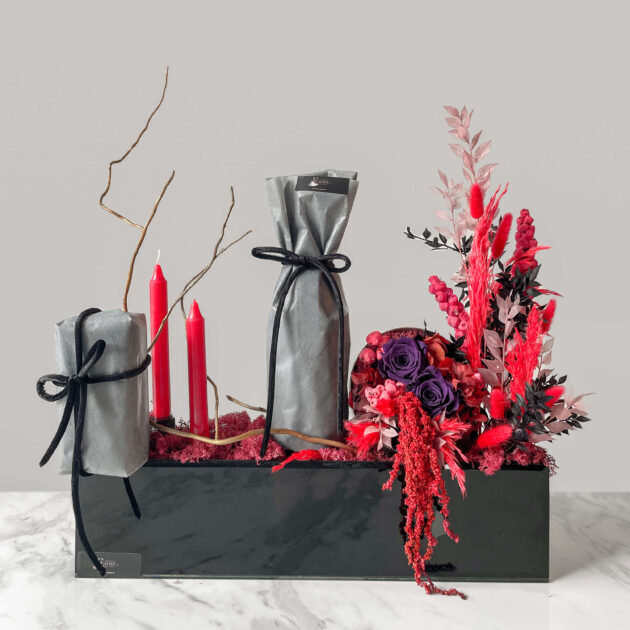 Interior preserved flowers arrangement with gifts